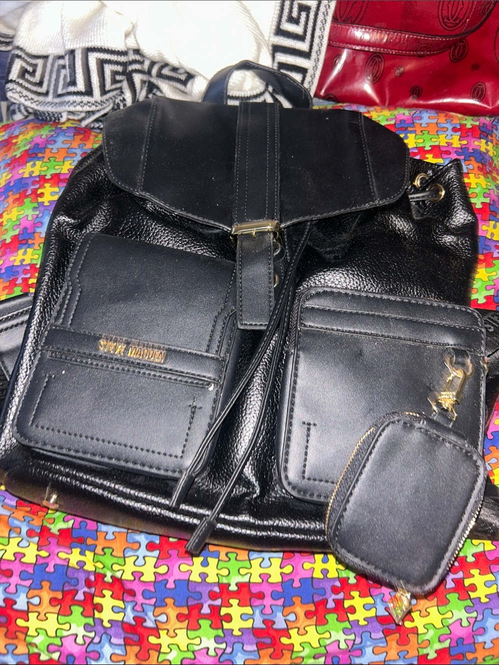 Steve Madden Black Leather Drawstring Backpack with Front Pouches